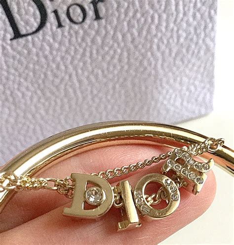 dior gold bangle